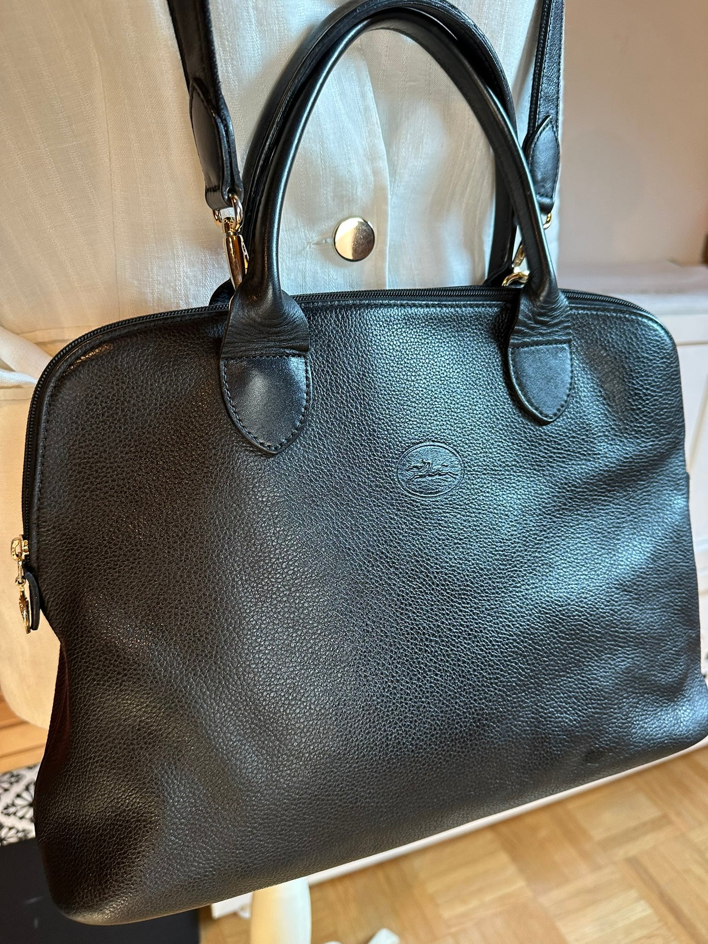 Sac Longchamp "Le Foulonné" en cuir noir.