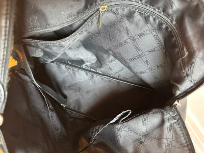 Sac Longchamp "Le Foulonné" en cuir noir.
