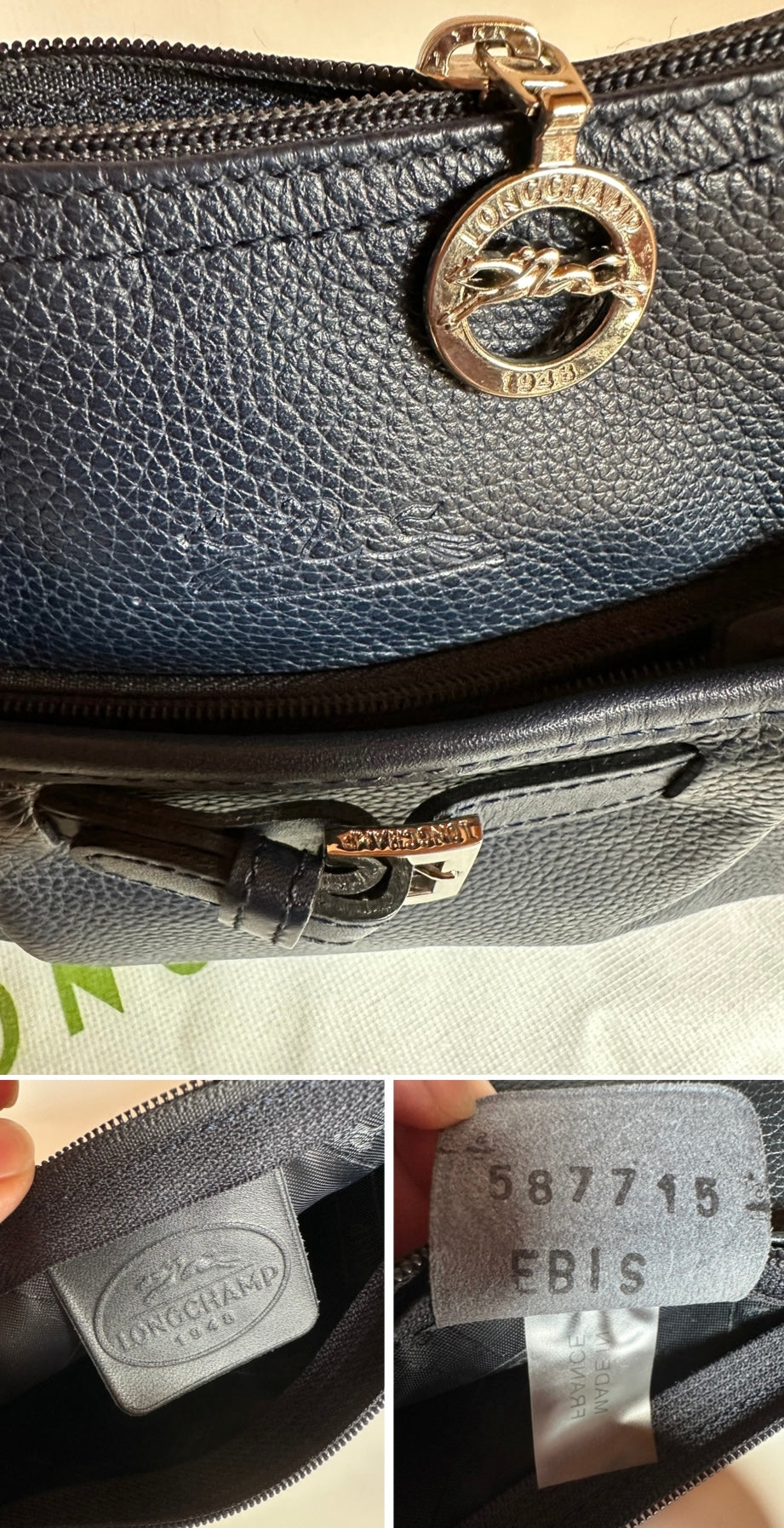 Longchamp Sac cuir bleu marine porté épaule.