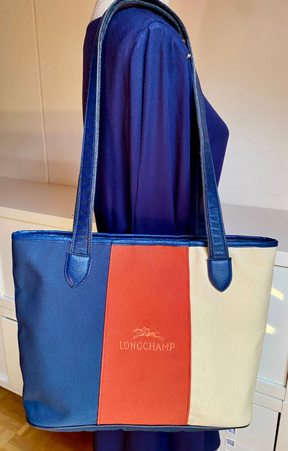 Longchamp Dreifarbige Tragetasche aus Canvas & Leder.