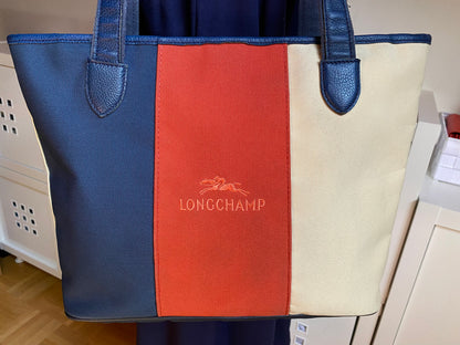 Longchamp Dreifarbige Tragetasche aus Canvas & Leder.