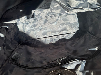 Longchamp Sac Roseau bronze porté épaule