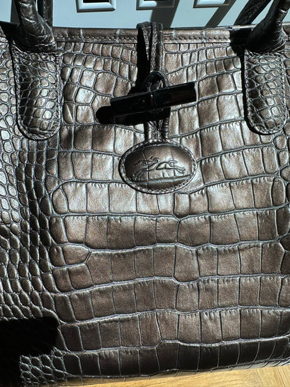 Longchamp Sac Roseau bronze porté épaule
