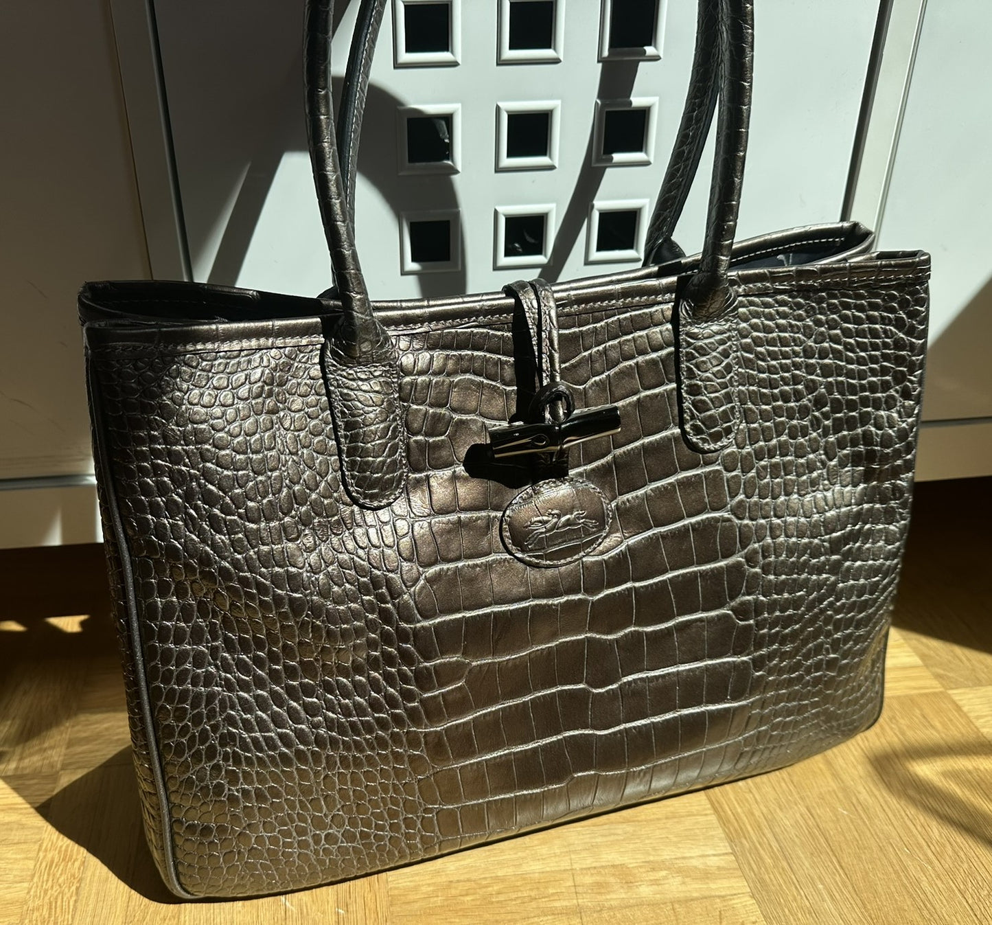 Longchamp Sac Roseau bronze porté épaule