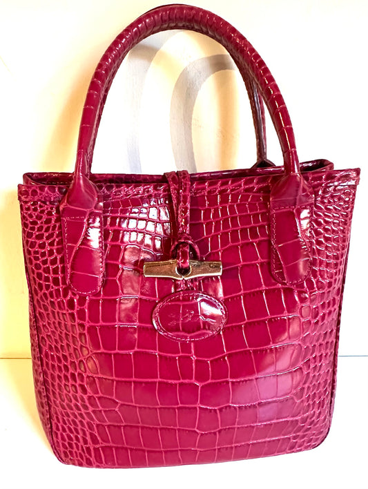 Longchamp Tasche Roseau Kroko-Optik Himbeere.