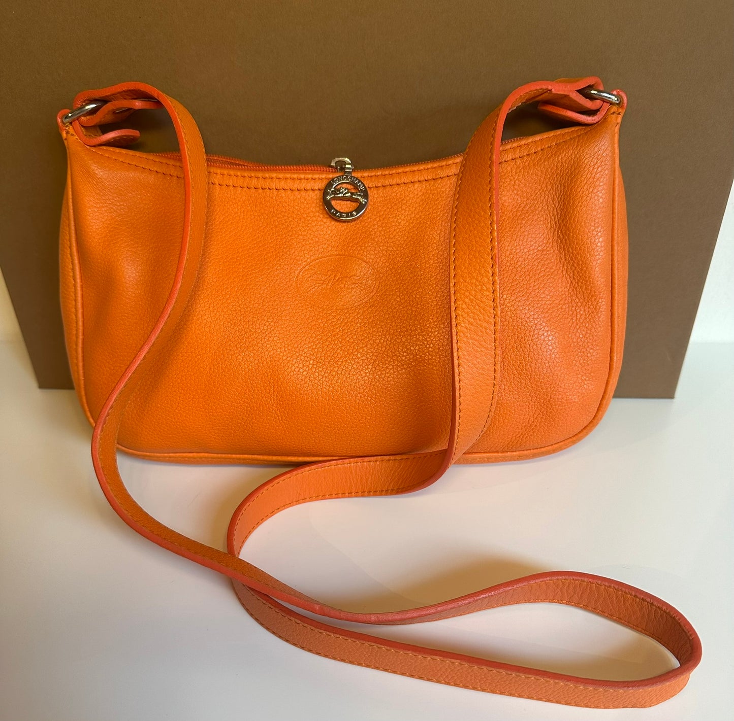 Sac Longchamp bandoulière orange - Le Foulonné.