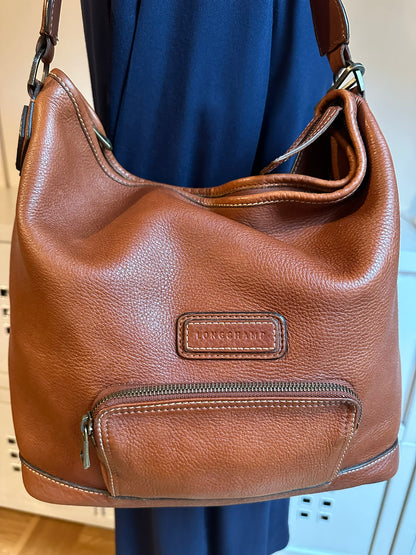 Longchamp "Légende Sport" Beuteltasche im Hobo-Stil aus cognacfarbenem Leder