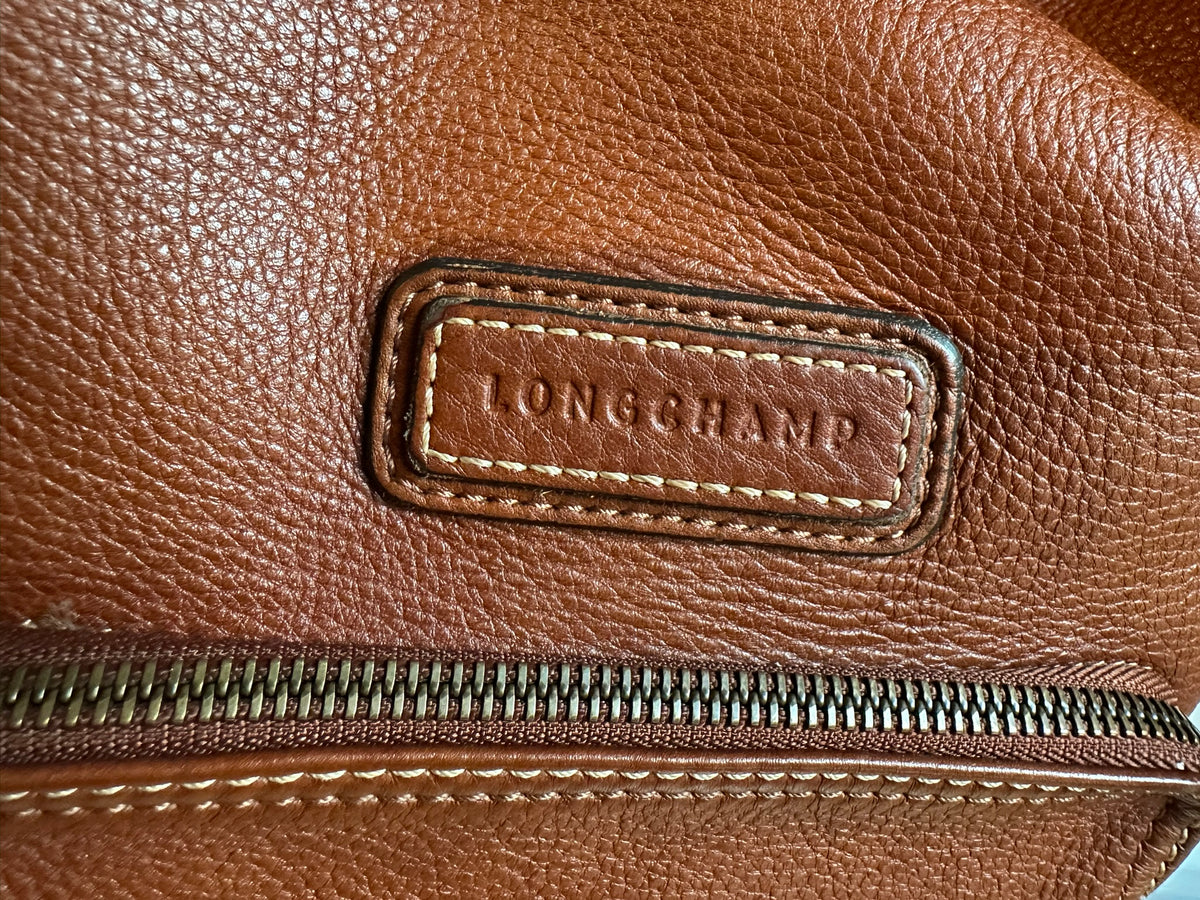 Longchamp "Légende Sport" Beuteltasche im Hobo-Stil aus cognacfarbenem Leder