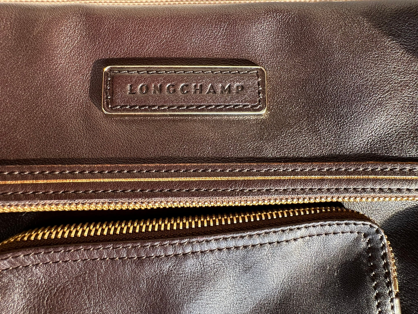 Longchamp Clutch cuir chocolat