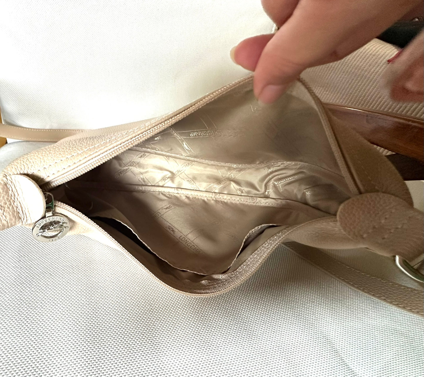 Sac Longchamp bandoulière beige - Le Foulonné.